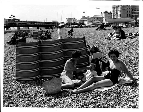 Enjoying The Sun On Brighton Beach C1960s Brighton Beach British