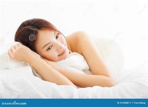 beautiful asian woman relaxing on the bed stock image image of lady fresh 47258811