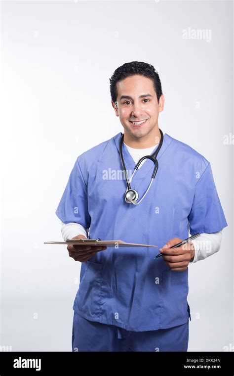 Smiling Male Nurse Holding Clipboard Stock Photo Alamy