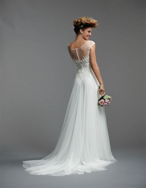 Above, stunning sahara, a strapless bias strip fluted gown in ivory silk satin organza. Watters Wedding Dresses Spring 2014