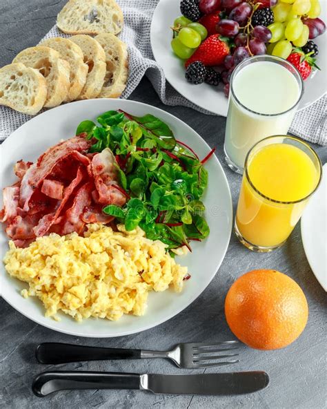 Morning Scrambled Egg Bacon Breakfast With Orange Juice Milk Fruit