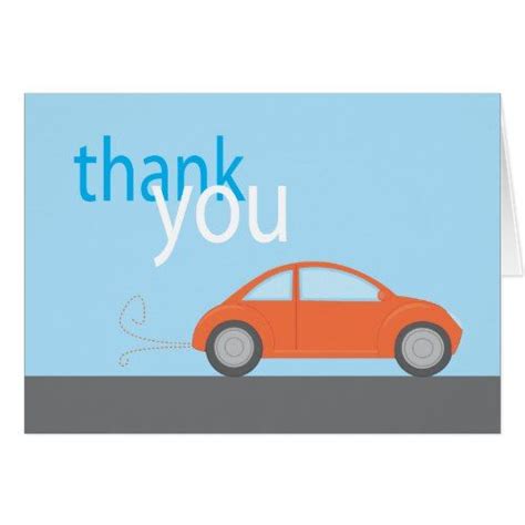 A Thank Card With An Orange Car Driving Down The Road In Front Of A