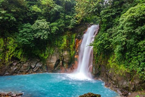 Celestial Blue Waterfall And Pond In Tenorio National Park Costa Rica