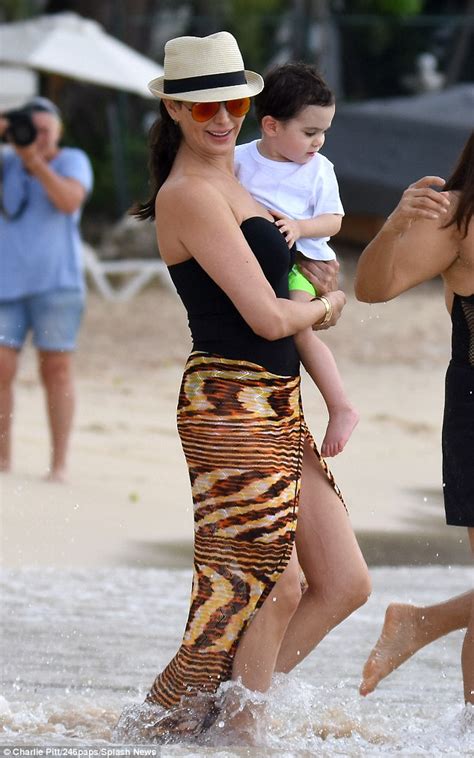 lauren silverman takes son eric for a dip in barbados daily mail online
