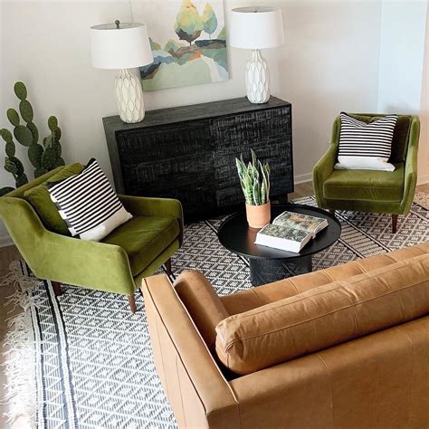 If you feel your olive green couch is to calm and natural, you bring some statement pop using orange throw pillow. Matrix Yarrow Gold Chair in 2020 | Green couch living room ...