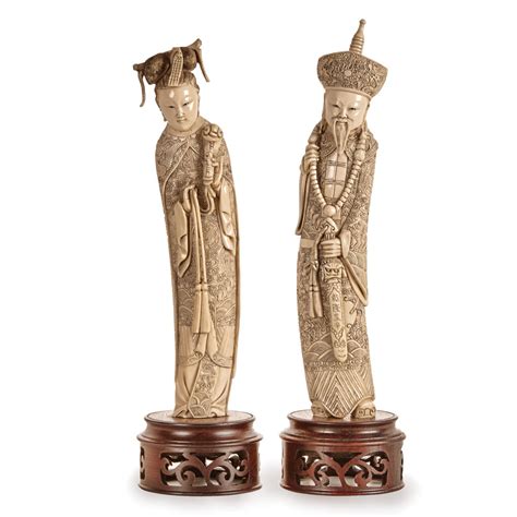 A Pair Of Chinese Ivory Figures Of Emperor And Empress