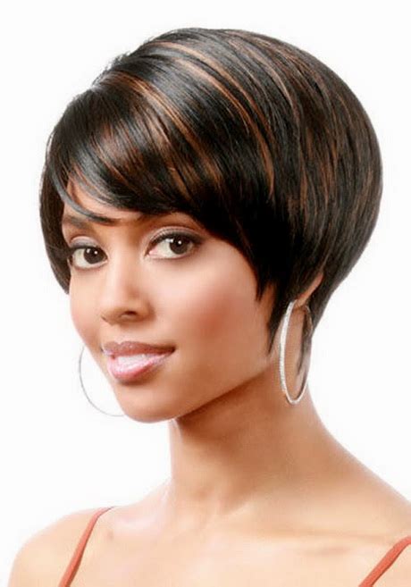 A black pixie bob with short layers helps springy curls come to life. Black feathered hairstyles