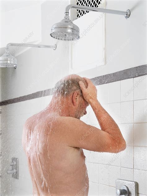 Older Man Showering In Locker Room Stock Image F Science