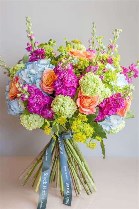 Select from premium hydrangea bouquet of the highest quality. A bright and vibrant bouquet consisting of coral "Miss ...