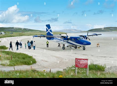 Twin Otter Aircraft On Barra Airport Beach Hi Res Stock Photography And
