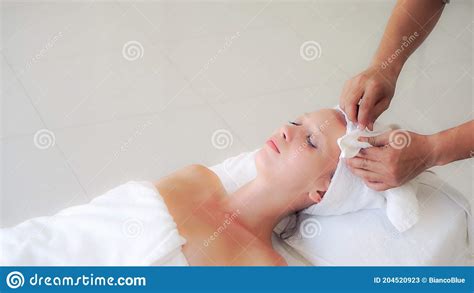 Woman Gets Facial And Head Massage In Luxury Spa Stock Image Image Of Lying Face 204520923