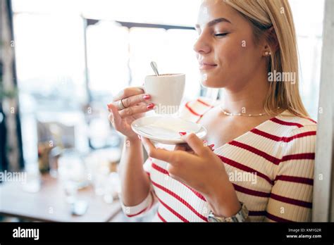 Attractive Blonde Drinking Morning Coffee Hi Res Stock Photography And