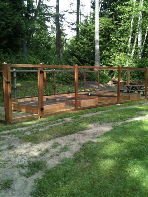The guy showed how to make this fence that i am about to share with you below. North Island Cottage: Planting Seeds