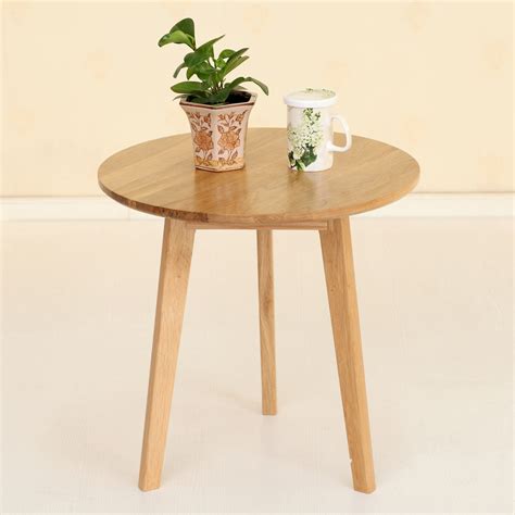 Nesting tables like these white stunners can help keep a space both multifunctional and stylish. Round oak coffee table a few small round sub wood tables ...