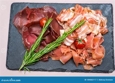 Assorted Cold Cuts With Herbs On A Plate Horizontal Frame Stock Image