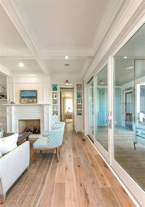 Each of the rooms featured in this post include natural wood. Mahshie Custom Homes | Beach house interior design, Beach house interior, Coastal interiors
