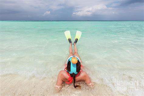 Woman Wearing Snorkeling Mask And Fins Ready To Snorkel In The Ocean Maldives Photograph By