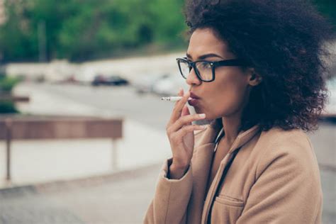Black Woman Smoking Cigarette Stock Photos Pictures And Royalty Free