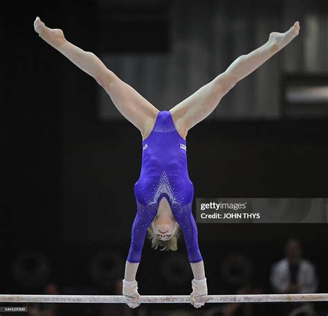 Russias Anastasia Grishina Performs On The Uneven Bars During The