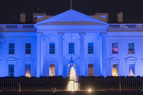 Donald Trump Lights The White House Blue To Honor Slain