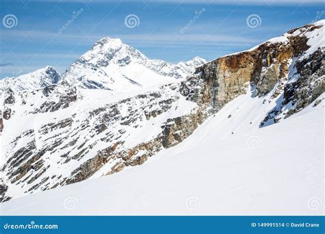 Mount Sir Donald In Glacier National Park Over Orange Rock Band Below