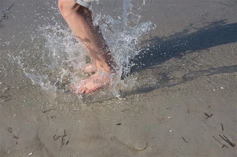 A Child S Feet At The Beach Stock Photo Image Of Jumping Child