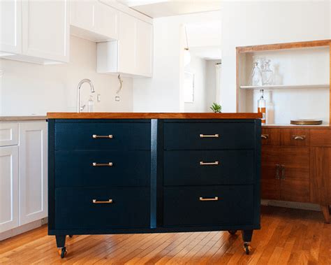 Find a sturdy base such as an old desk, two dressers back to back, or even sturdy wire shelving placed on its side. From Dresser to Island! | Yellow Brick Home | Bloglovin'