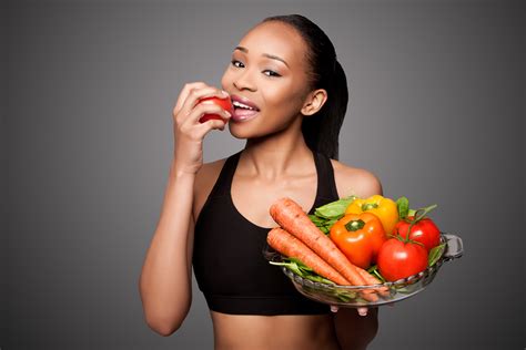 Happy Healthy Black Asian Woman Eating Vegetables Dentists At Orenco Blog