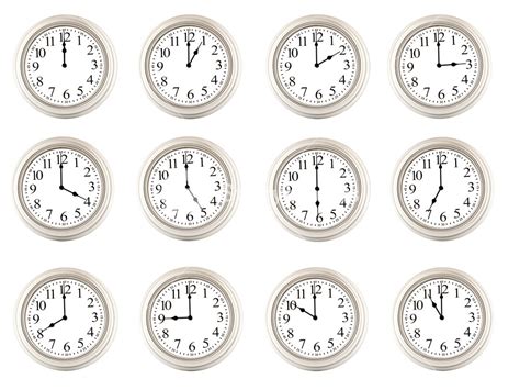 Twelve Clocks Showing Different Times Royalty Free Stock Image