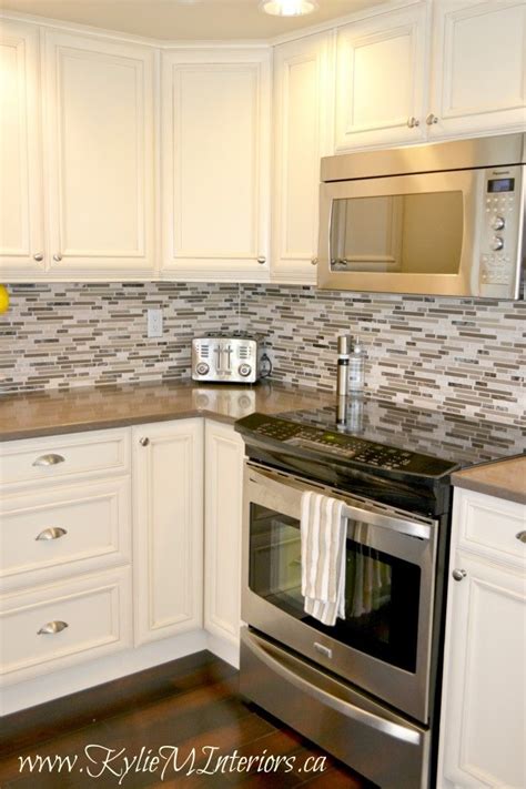 Check spelling or type a new query. Oak Kitchen Remodel - Painted Cream Cabinets and Quartz ...