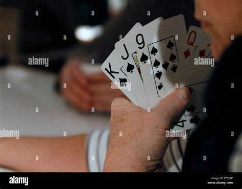 Playing Cards In Hand Stock Photo Alamy