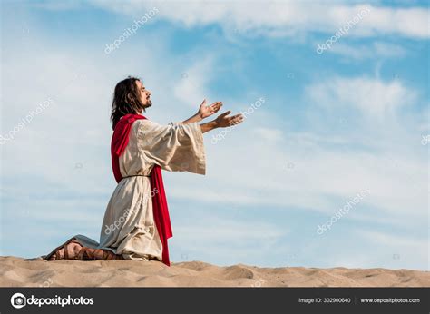 Jesus Praying Knees Sand Desert Sky Stock Photo By ©andrewlozovyi 302900640