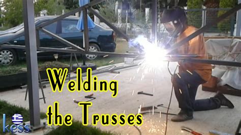 Wear a welding helmet to prevent injury to your eyes during welding. How to Build a Steel Structure House Part6 Welding Roof ...