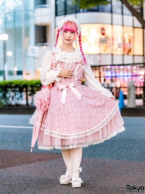 Online shop of japanese clothes inspired by japanese street fashion and its traditional culture with many clothing designs mostly made by today, the style of japanese people has introduced the world to important young and trendy japanese districts such as shibuya or harajuku and allowed the. Pink-Haired Harajuku Girl in Japanese Lolita Fashion w ...