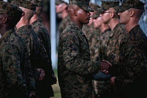 Marines Receiving Emblems After Completing Recruit Training