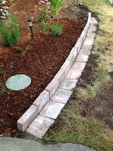 New Flower Bed Bordermade From Pavers And Allowed The Lawnmower To