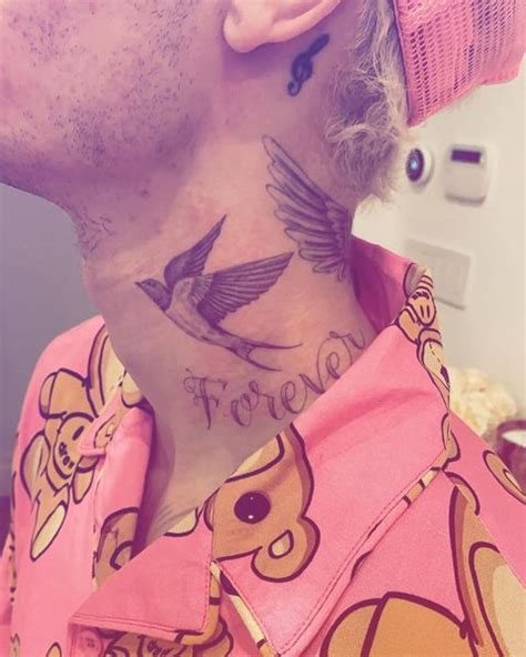 Justin Biebers Tattoos The Meaning Behind Justin Biebers Tattoos