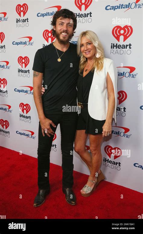 Chris Janson And His Wife Kelly Lynn Arrive At The Iheartcountry