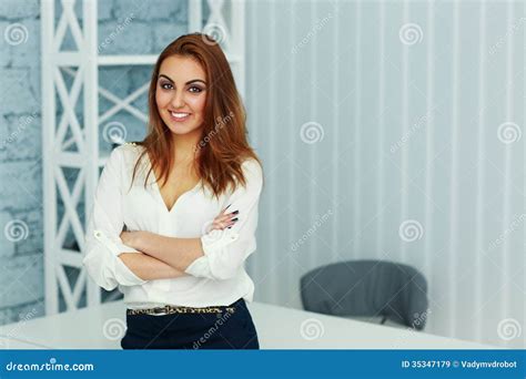 Young Beautiful Businesswoman Standing With Arms Folded Stock Image Image Of Crossed