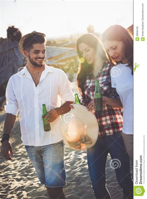 Happy People Drinking And Having Fun At Beach Stock Photo Image Of