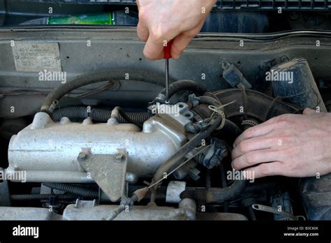Mechanic Working On An Engine Stock Photo Alamy