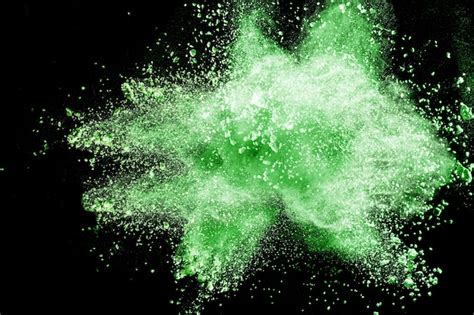 Premium Photo Green Powder Explosion On Black Background