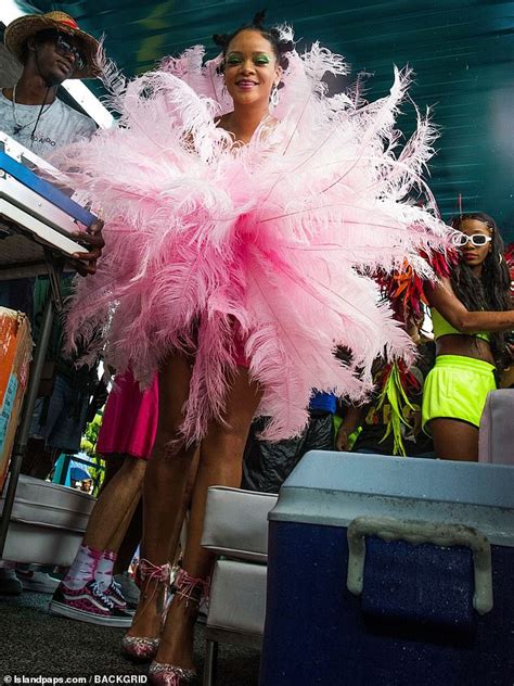 Rihanna Makes Her Presence Felt In Flamingo Feathered Pink Dress At The