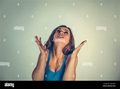 Furious Stressed Woman Screaming Looking Up In Frustration Hands In