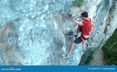 Couple Rock Climbers Climbing On Tough Sport Routes Man Clipping Rope