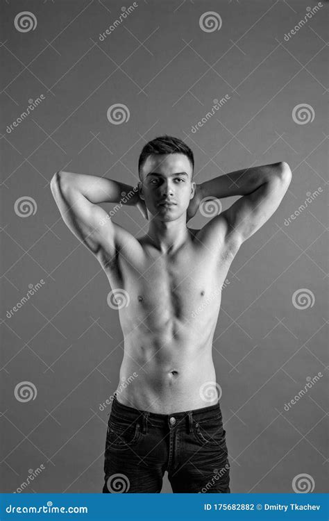 Young Man Posing In Studio Gray Background Stock Photo Image Of Cool