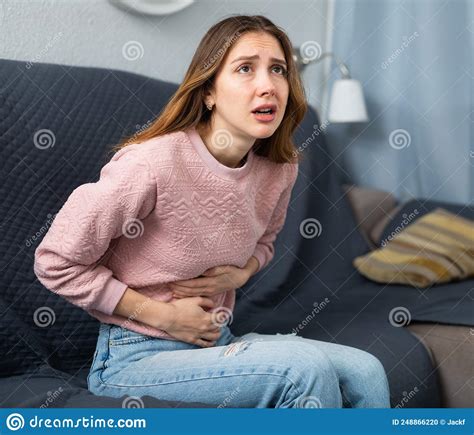 Young Woman Suffering From Abdominal Pain Stock Photo Image Of