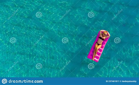 Young Pretty Woman With Perfect Body Lying On Air Mattress Stock Image Image Of Sunbathing