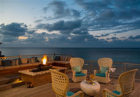 Bring a bucket to collect ocean water, or bring your own water. A cozy fire pit with an ocean view | Sandals Resorts ...