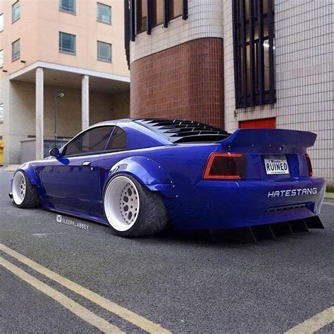 Setting off car alarms is quite satisfying #new edge mustang #mustang #2000 mustang gt #sleeper #red mustang. #Mustang #Ford #Heavily_Modified #Custom #Slammed #Stance ...